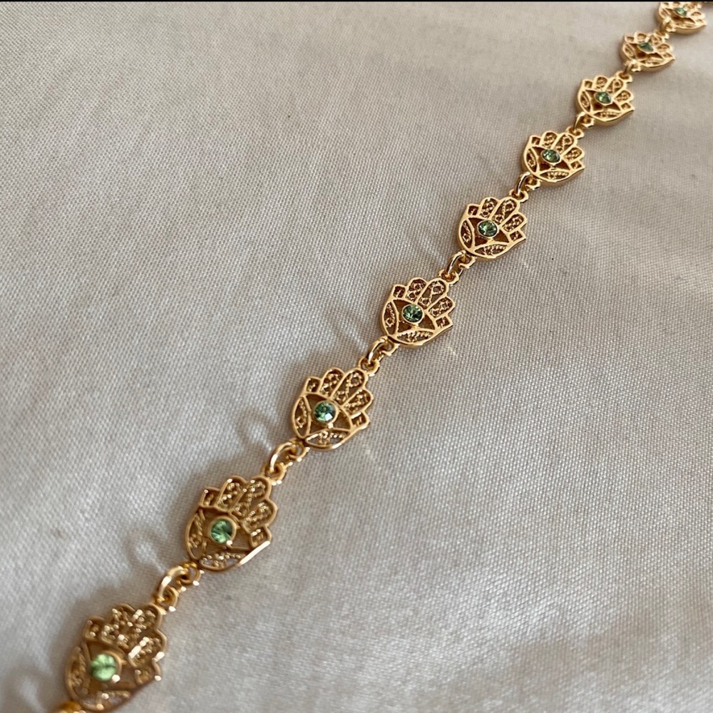 Gold Tone Hamsa Bracelet with Green Stones